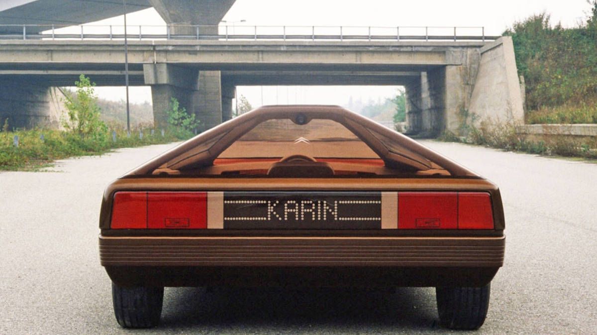 A photo of the back of the car, where is has Karin written between the taillights
