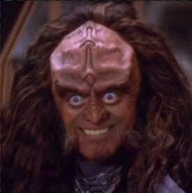 Gowron gives his customary charming smile and jolly eyes.