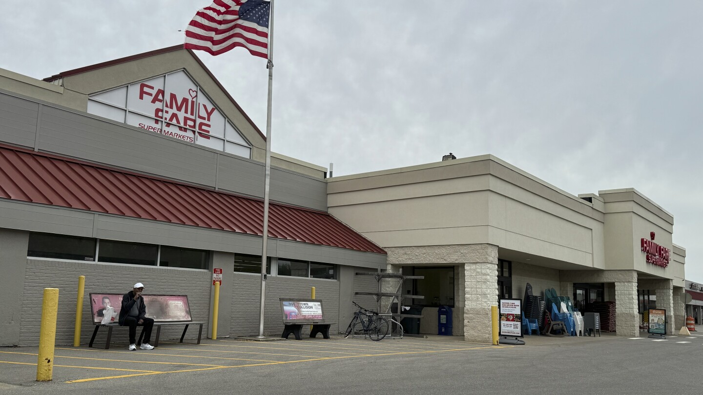 Homeless woman was living inside Michigan rooftop store sign with computer and coffee maker