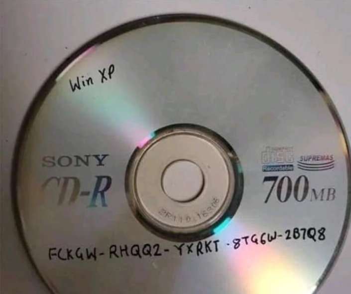 A blank CD with windows xp sharpied on it, it has the activation key "FCKGW-RHQQ2-YXRKT-8T66W-287Q8" Written on it.